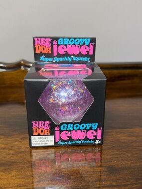 NeeDoh Groovy Jewel Sparkling  glitter - color purple- Schylling Brand
